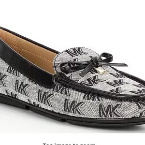 Michael Kors
Juliette Signature Logo Print Slip-On Moccasins. 7M